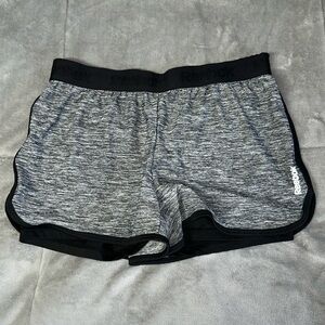 Reebok running‎ shorts with built in shorts. Size small.